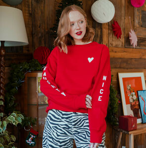 'Naughty Or Nice' Sleeve Christmas Jumper Sweatshirt from Not On The High Street